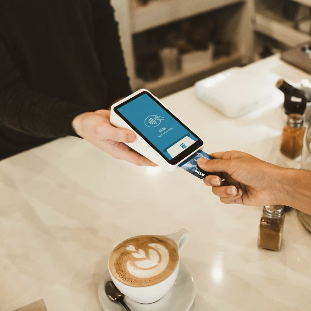 A card being inserted into a payment terminal