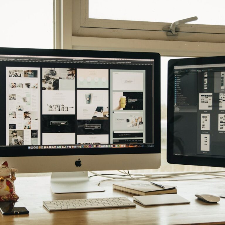 Two monitors set up side by side on a desk